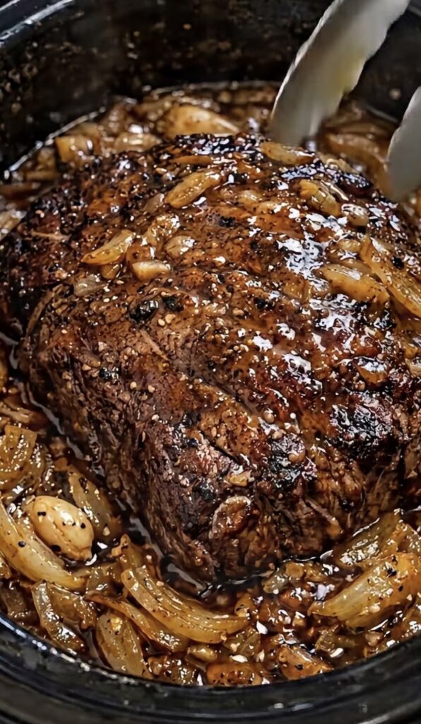 Slow Cooker Garlic Butter Beef Roast with Caramelized Onions and Rich Brown Gravy